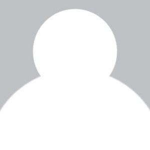 Silhouette of a person with a round head and shoulders against a gray background.