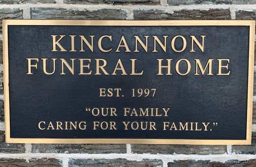 Several Photos of different caskets, gravestones, hearses, interior and exterior views of Kincannon Funeral Home in OK.