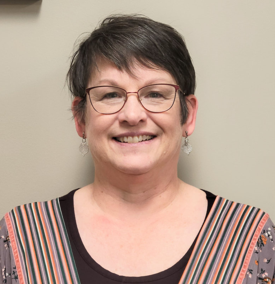 Janice Lowe, Rhea County Administrative Assistant and Student Support Specialist, wearing a professional outfit