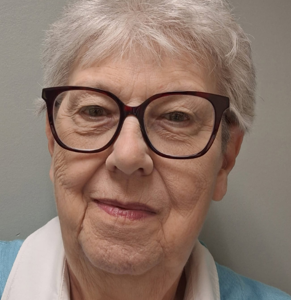 Sandra Fritts, Hamilton County student support specialist, wearing professional blue and white outfit