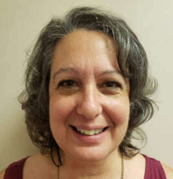 Gayle Patterson, Rhea County instructor, wearing a denim professional maroon outfit