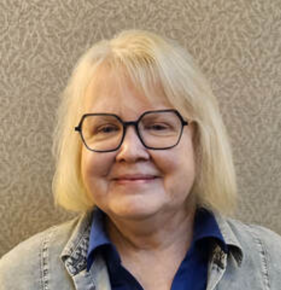 Sara Nichols, Hamilton County IELCE instructor, wearing a denim and blue profressional outfit