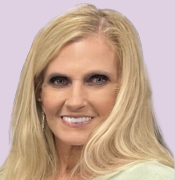 Debby Connor, Chief HiSET Examiner, wearing a yellow professional outfit