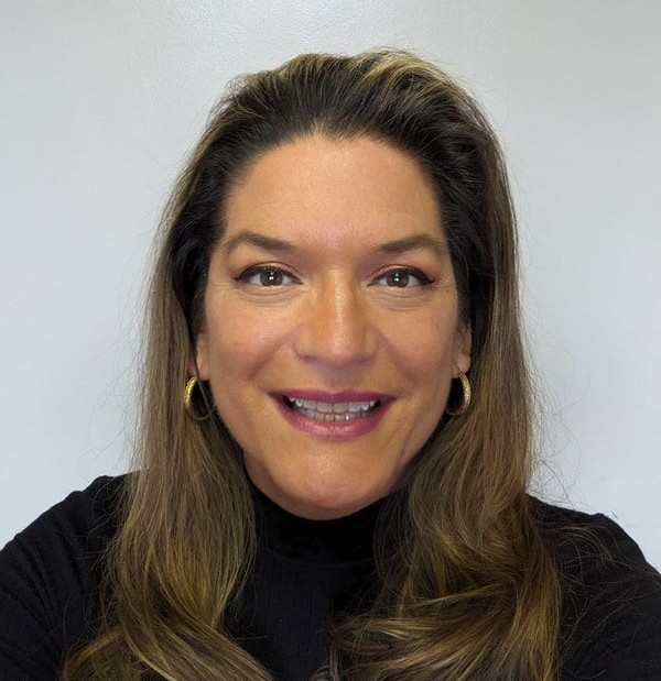 Melanie Smith, workforce career pathways coordinator, wearing a black professional outfit