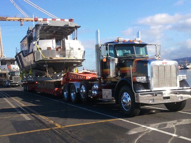 Truck transporting a boat