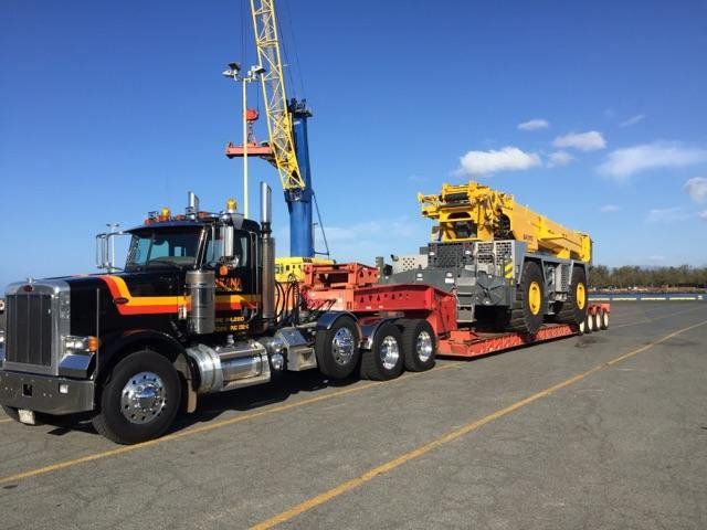 Heavy equipment being transported