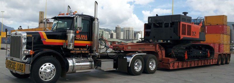 Heavy equipment being transported