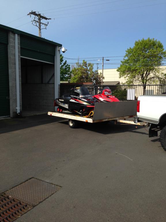 Moving 2 Jet Skis on Trailer into a Storage Unit