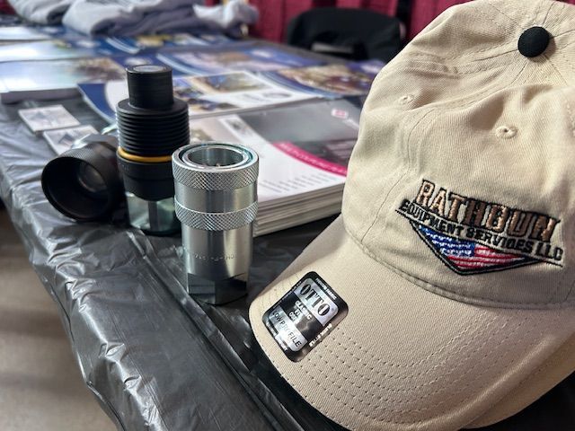 A hat that says patriot on it is on a table