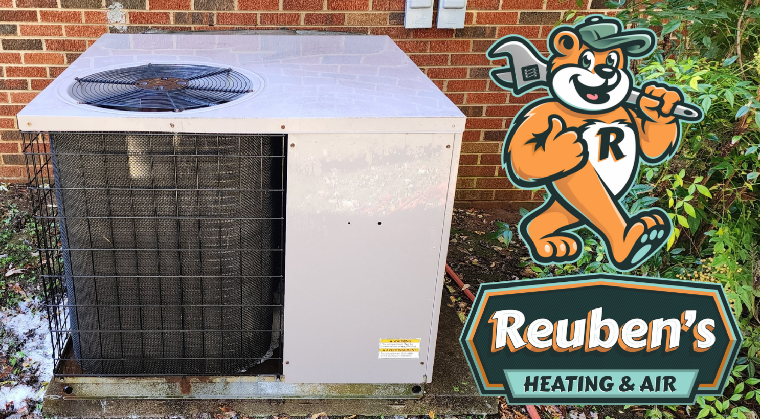 A picture of a clean heating and air unit beside a Reuben's Heating & Air logo