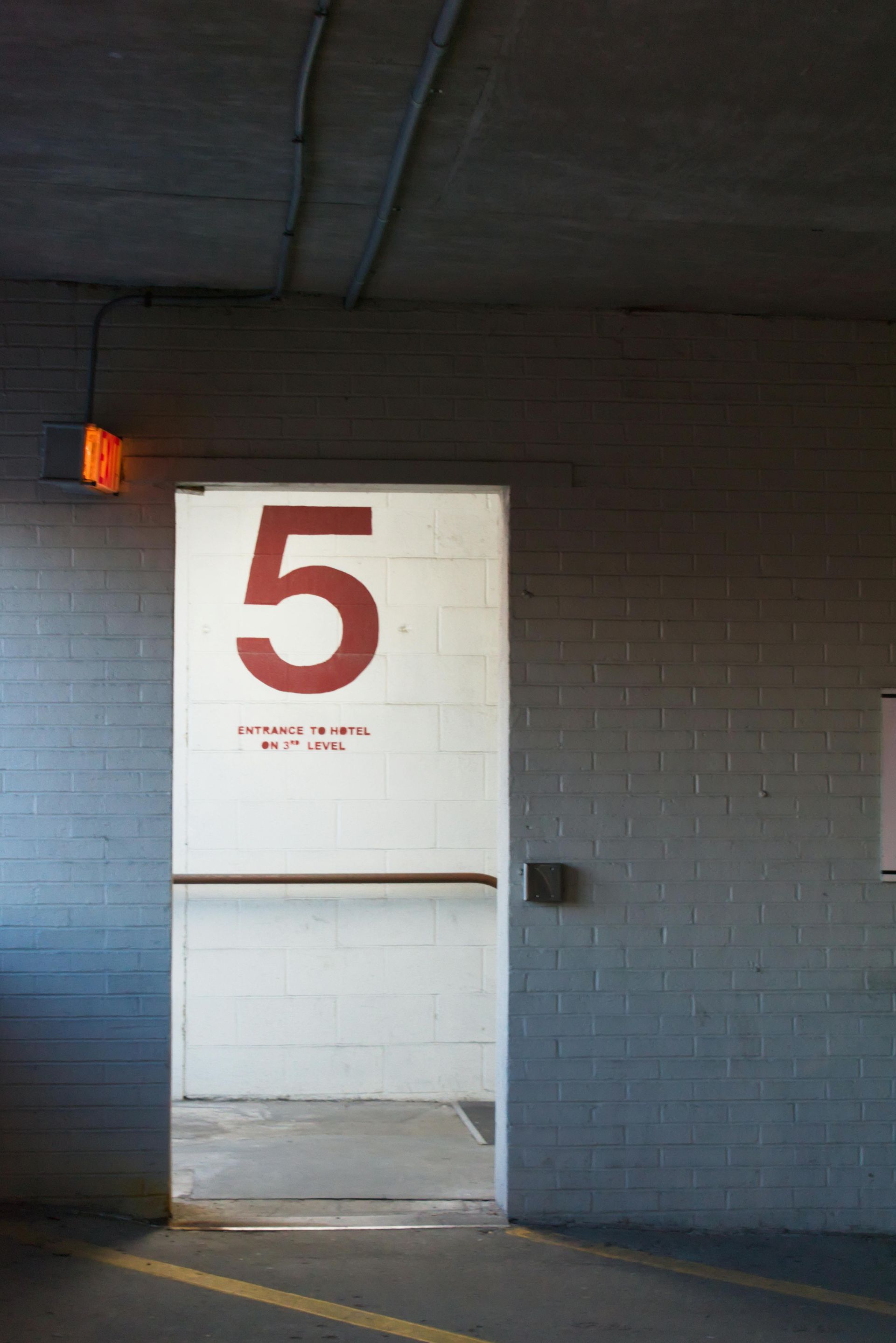 A door with the number 5 painted on it