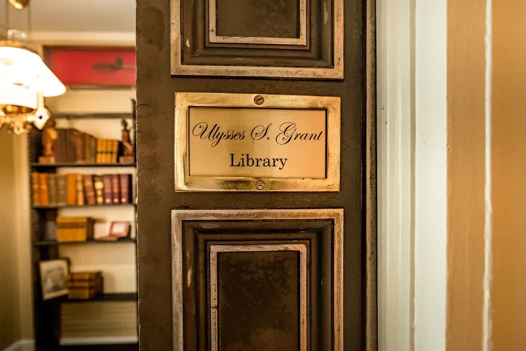 A brass plaque reading 