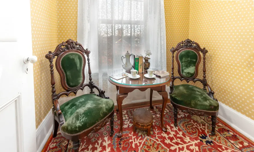 A sunset over a mountain range with a lot of fog