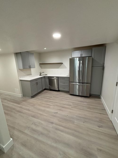 Simple kitchen with grey cabinets