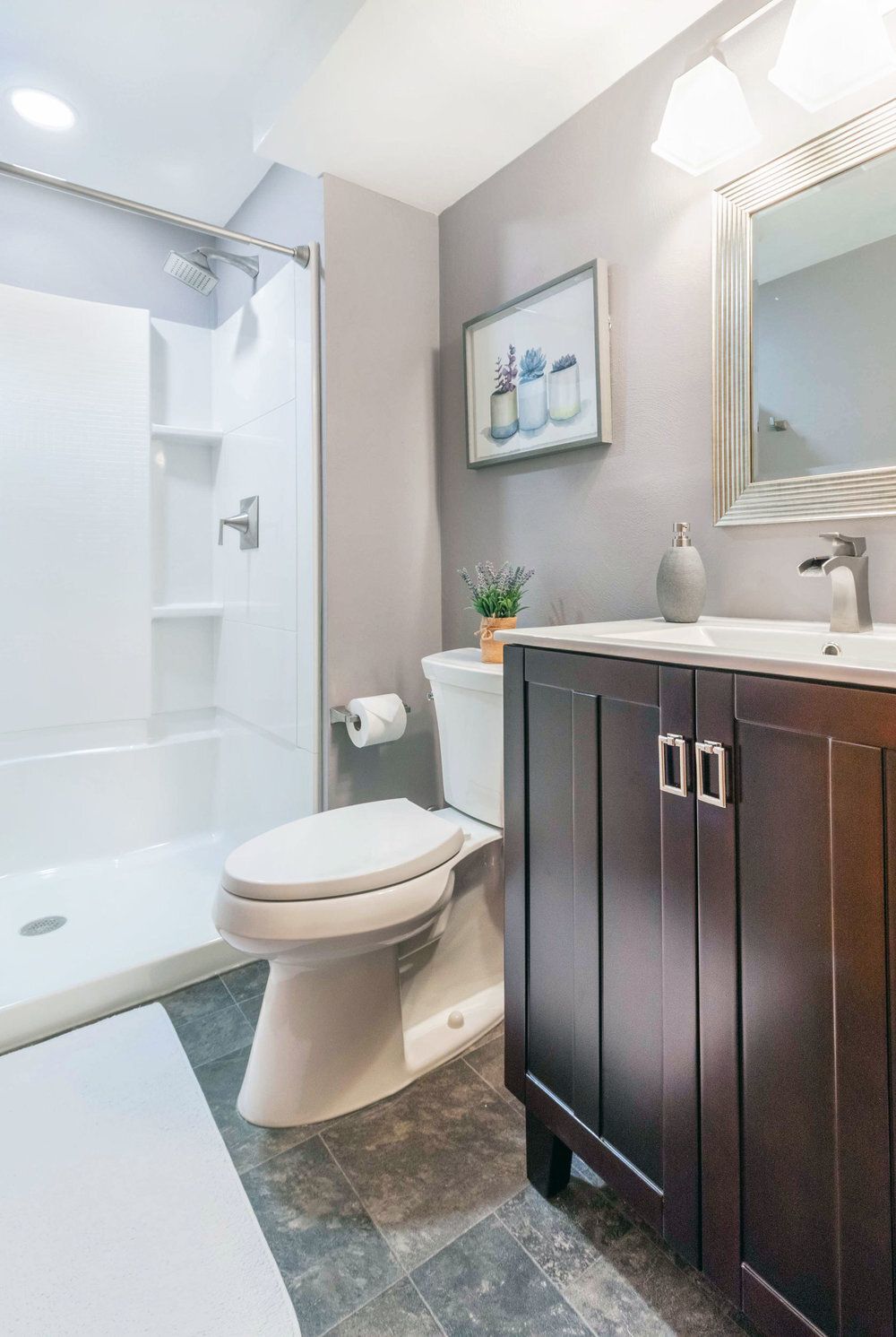 Bathroom with dark wood cabinet