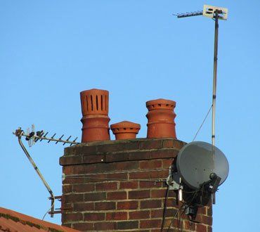 Satellite dish on Poynton chimney