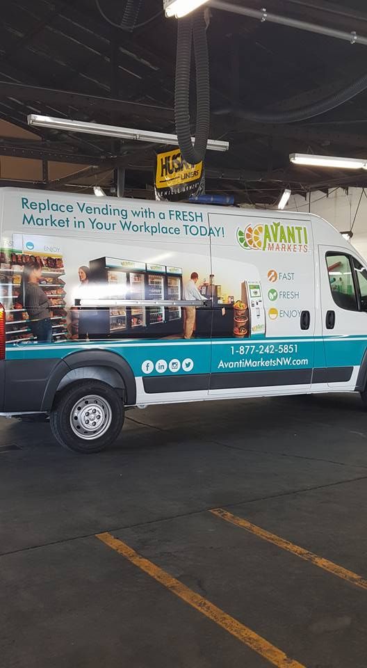 A white delivery van featuring the 