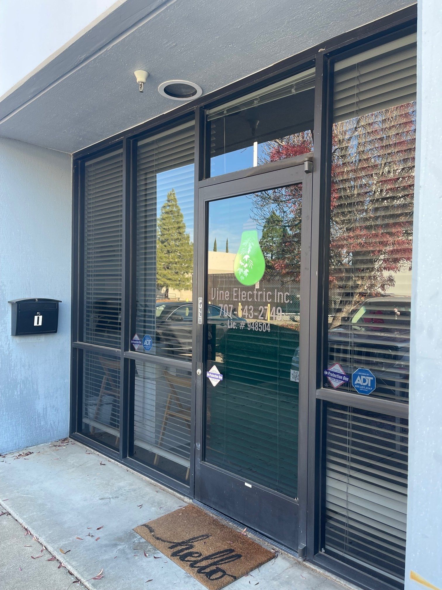 A building with a door that says hello on it