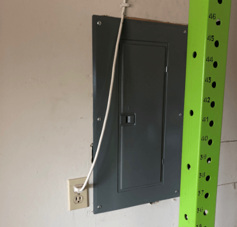 A green pole with the number 46 on it