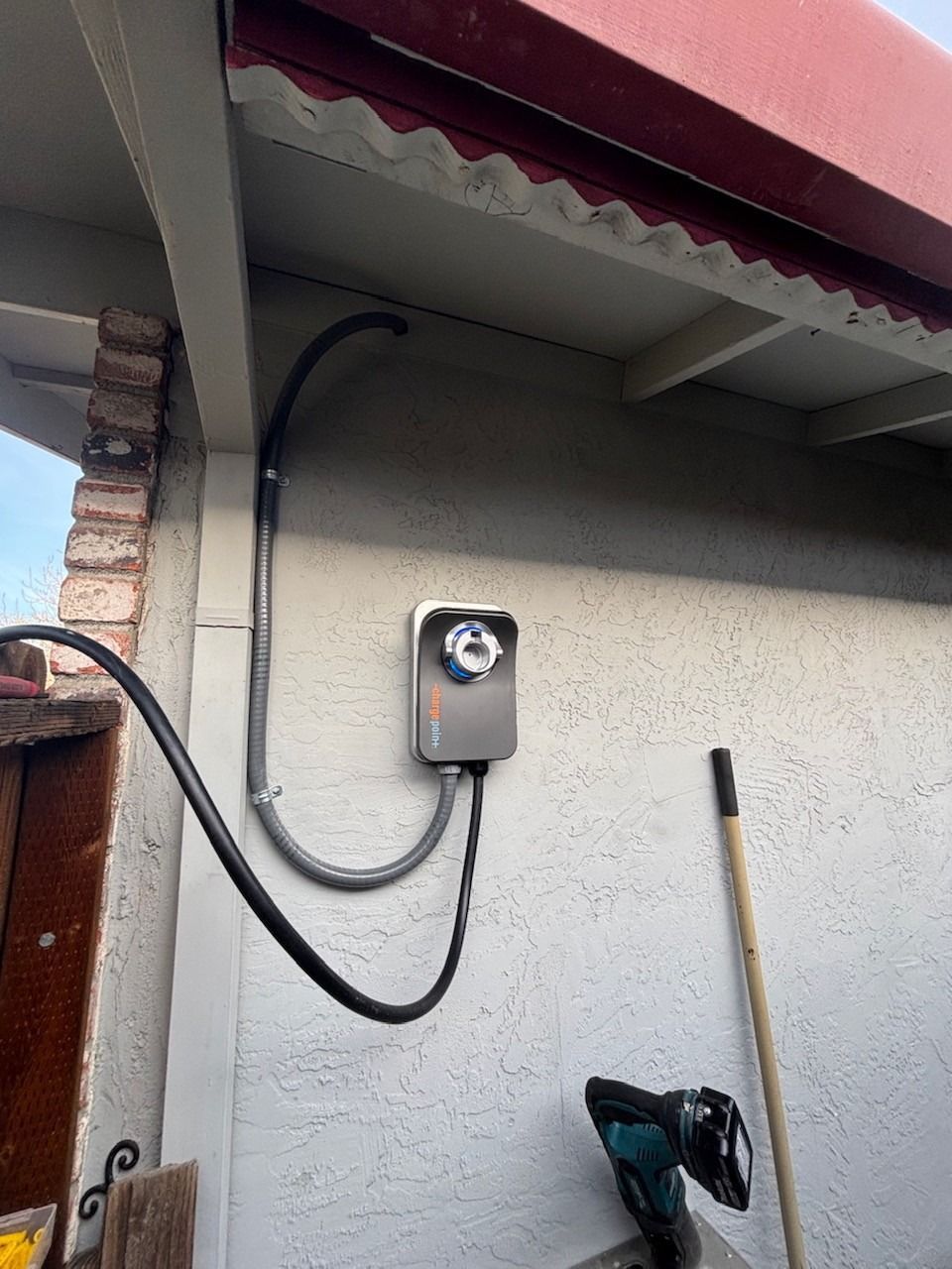 ev vehicle charging station on residential home installation