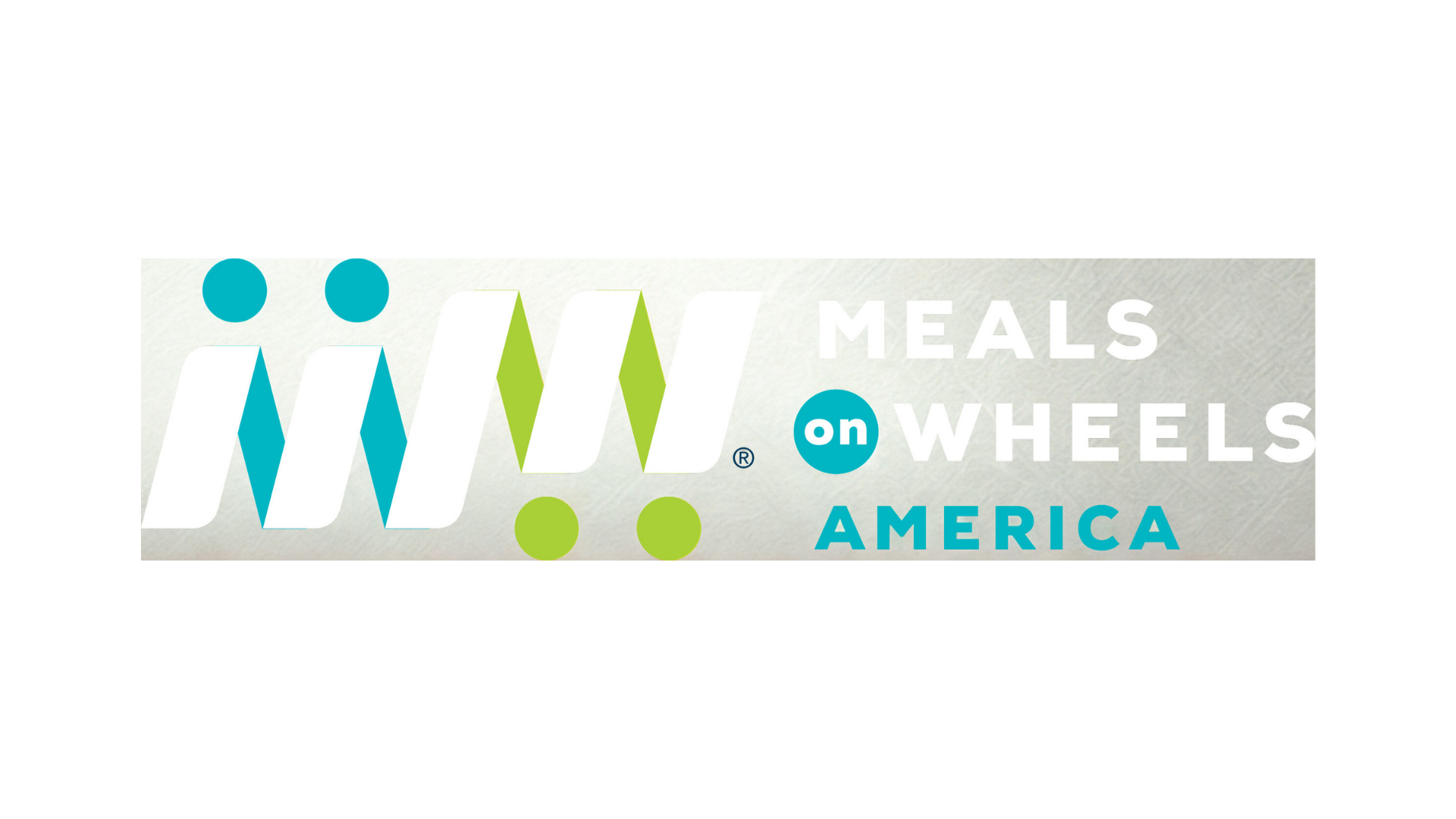 Meals on Wheels America logo. Silver background with colorful abstract figures and text.