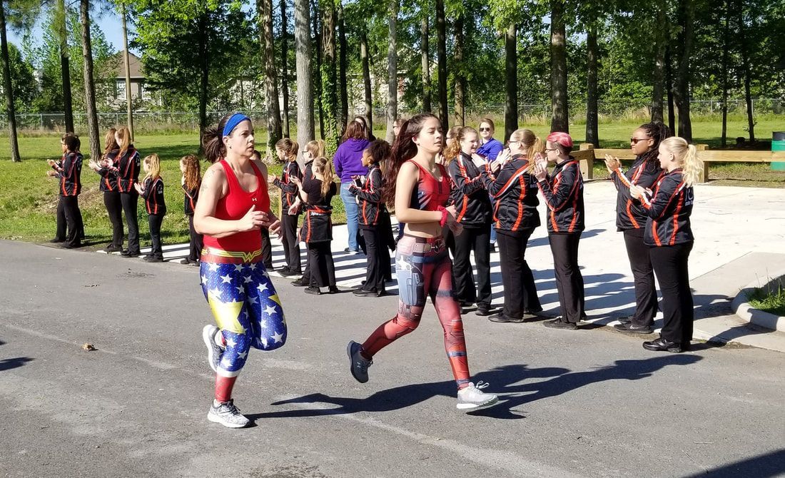 QMD Dance Teams Cheer on Super Hero 5K Runners 3