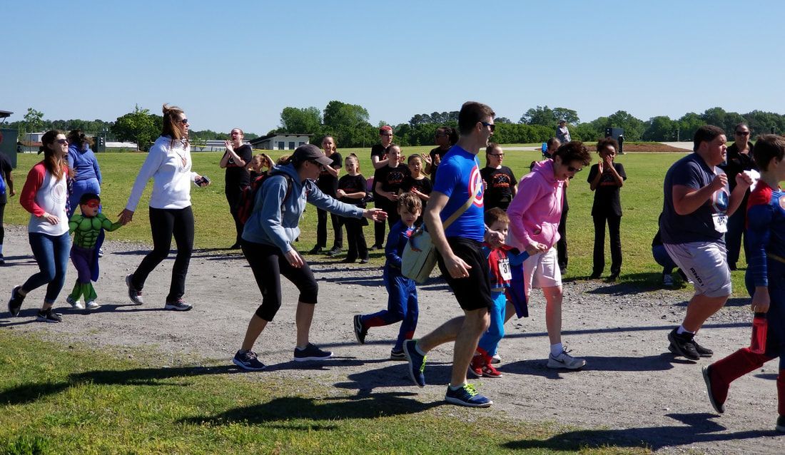 QMD Dance Teams Cheer on Super Hero 5K Runners 5