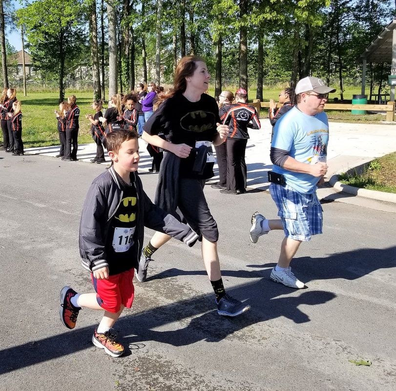 QMD Dance Teams Cheer on Super Hero 5K Runners 7