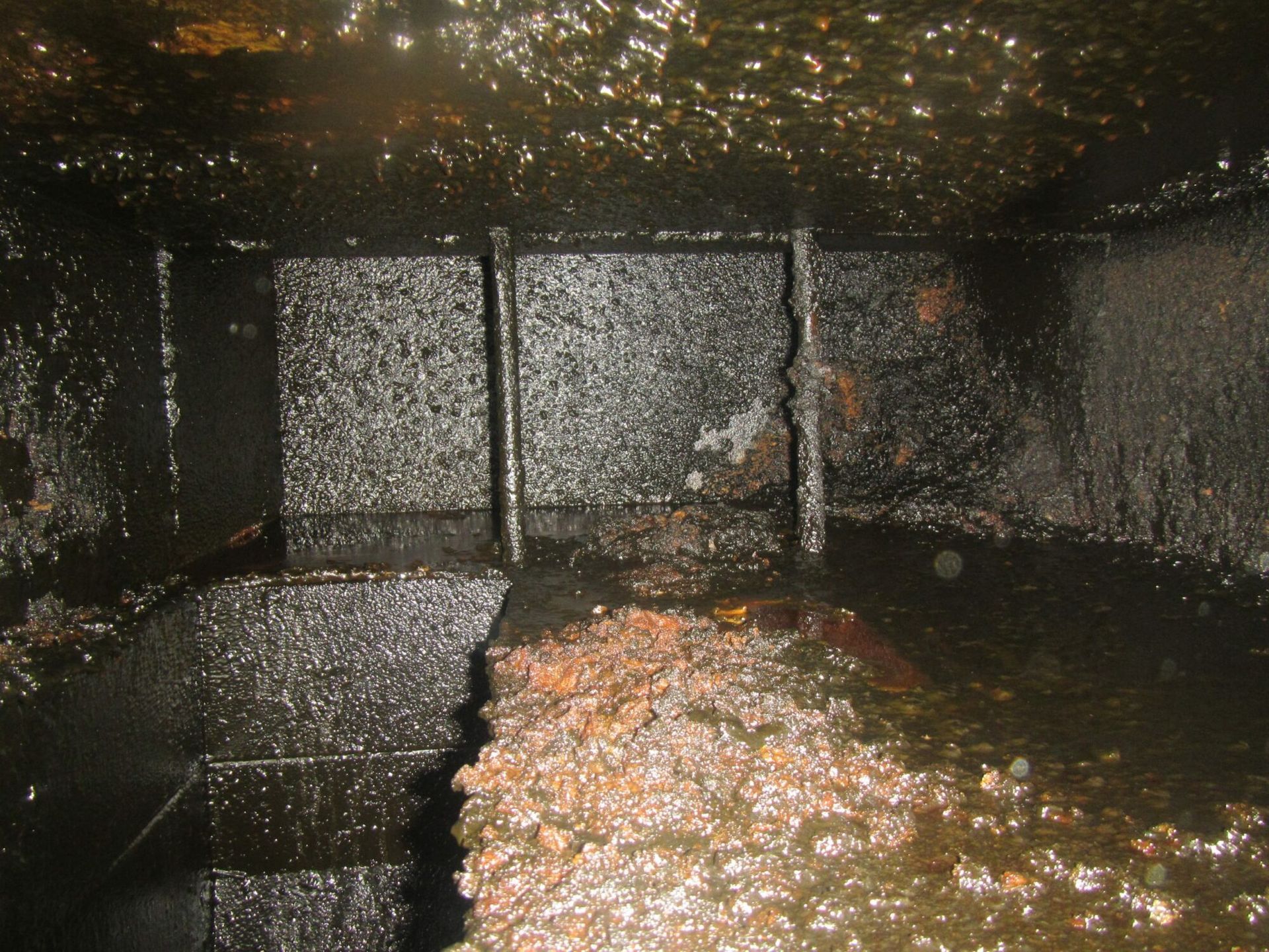 A dirty room with a lot of stains on it