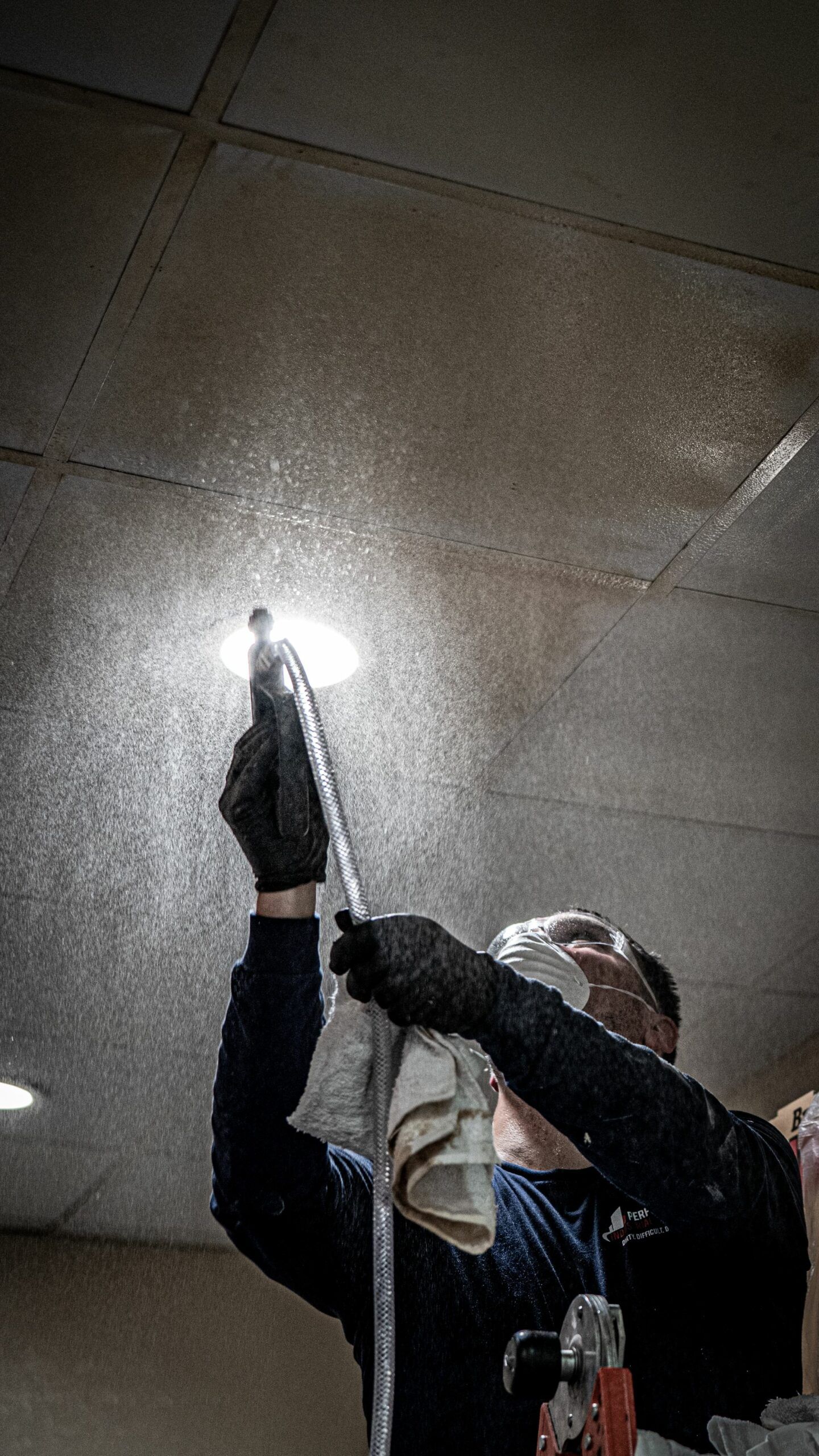 Man Is Holding A Light Bulb | S. Glens Falls, NY | Performance Industrial