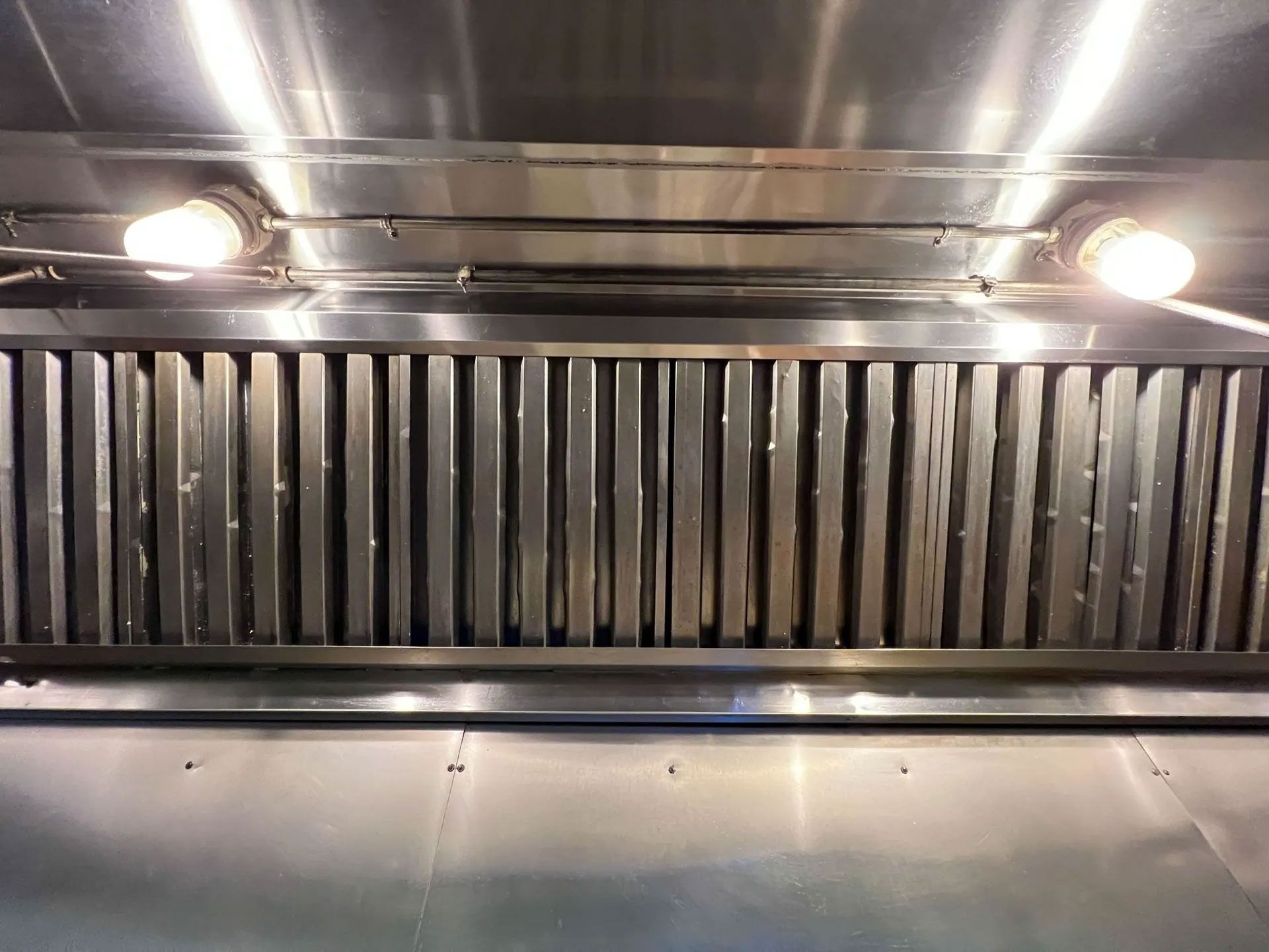 Close-up of an industrial exhaust hood after kitchen exhaust cleaning service.