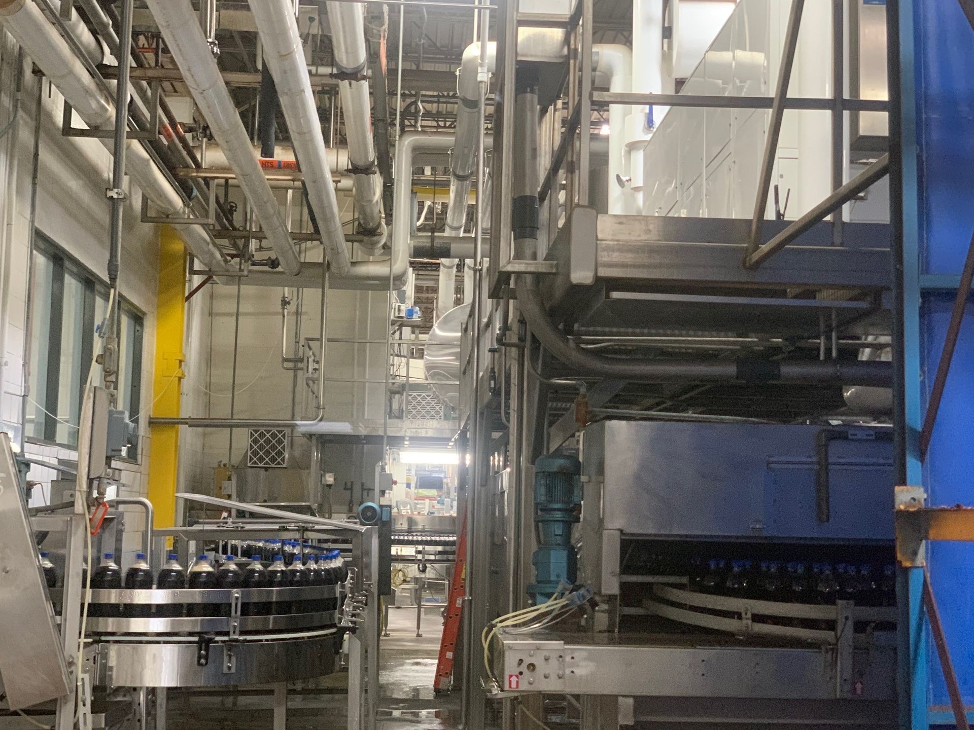 A Factory with A Lot of Pipes and Machinery | S. Glens Falls, NY | Performance Industrial