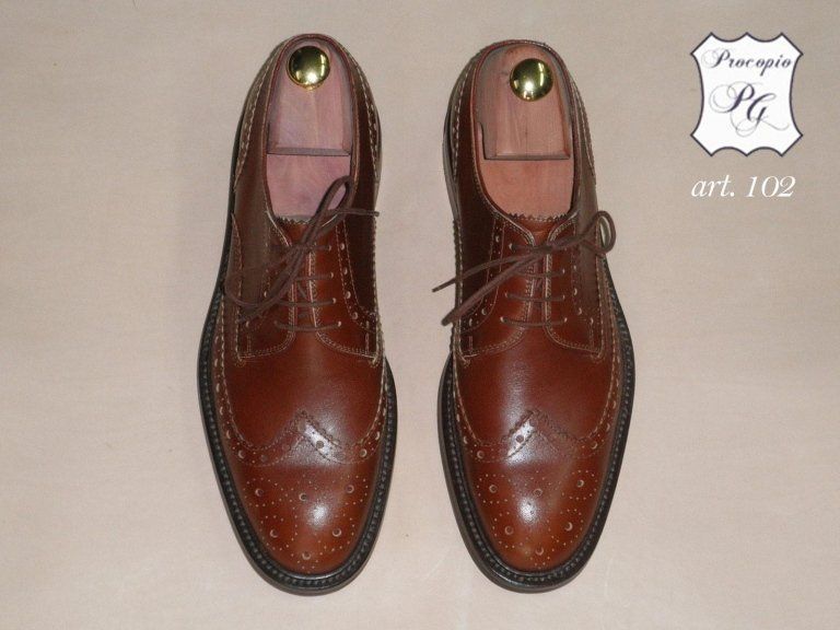 scarpe da uomo finemente lavorate da artigiani