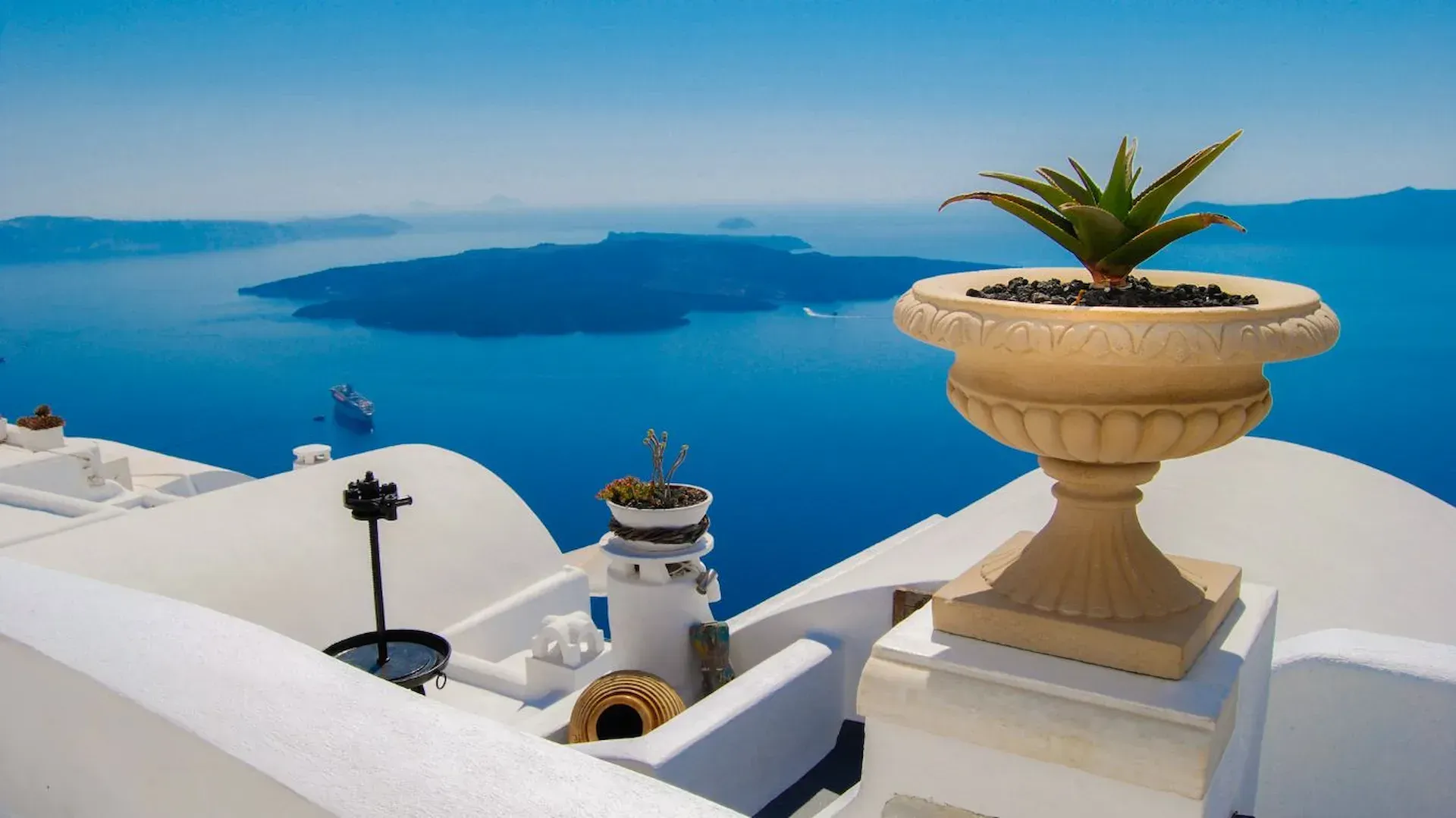 Cruise day in Santorini with blue domes view