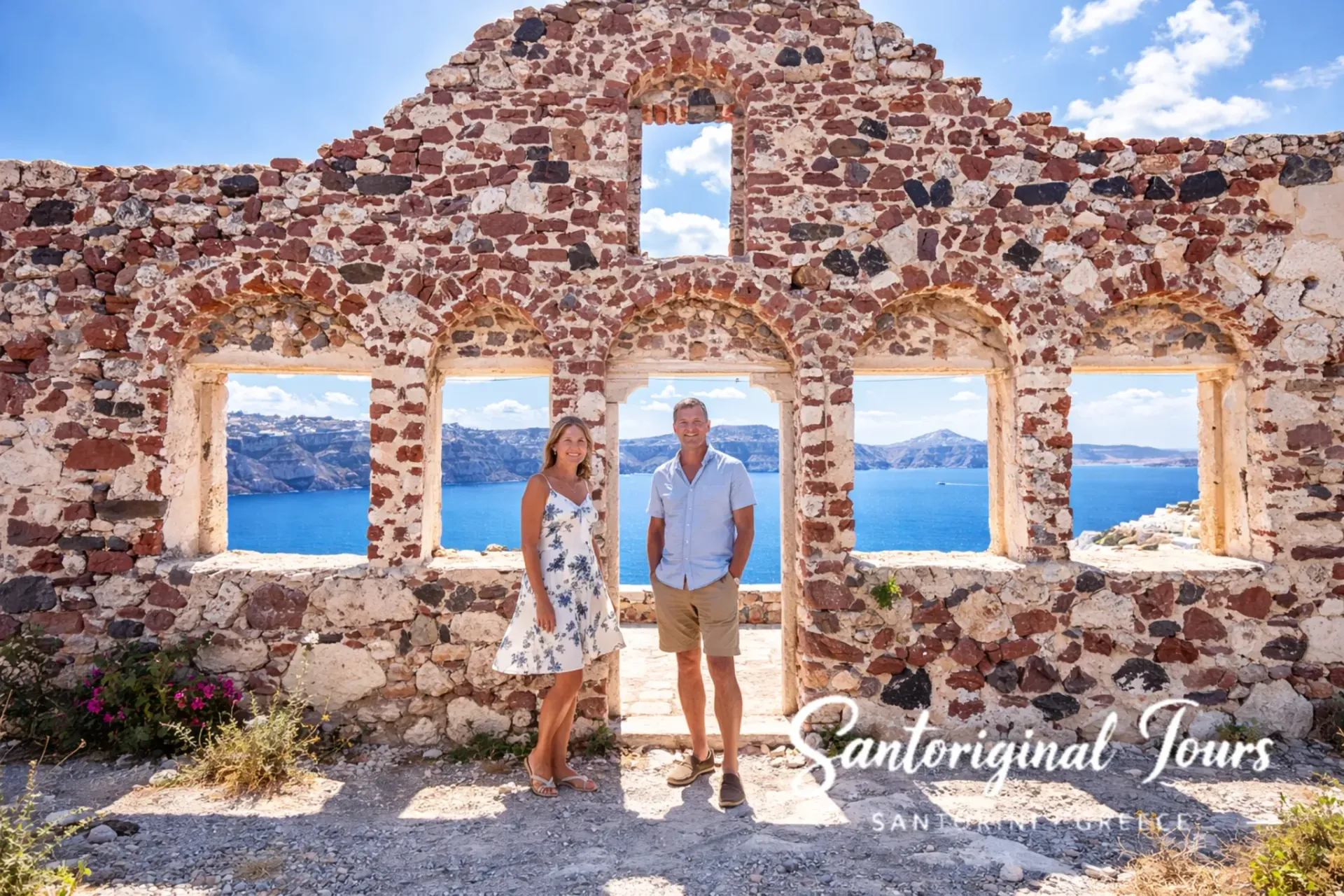 Couple on a Santorini private tour at a Old Castle of Oia
