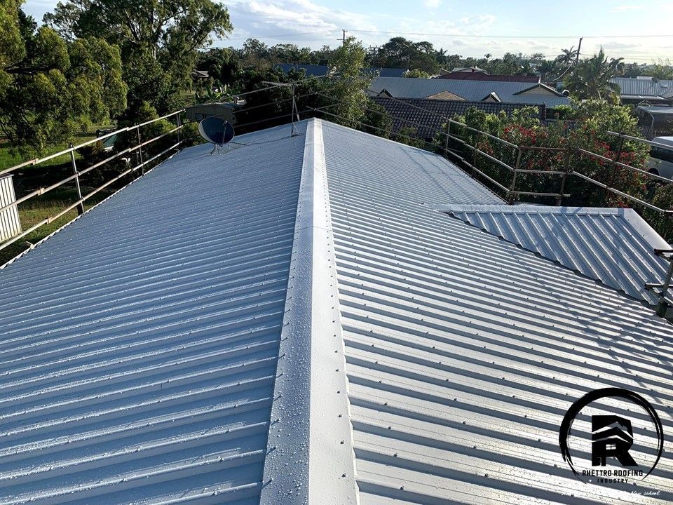 An Elevated View of a Newly Installed, Silver Corrugated Metal Roof — Rhettro Roofing Industry in Taroomball, QLD