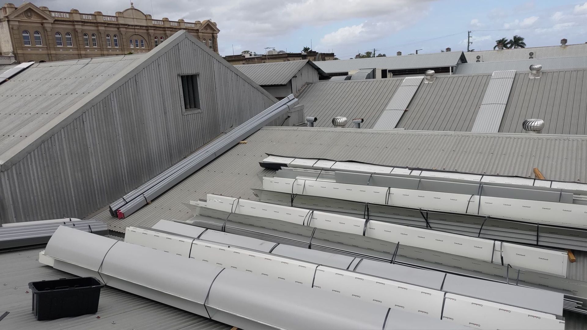 A View of a Grey Corrugated Metal Roof — Rhettro Roofing Industry in Taroomball, QLD