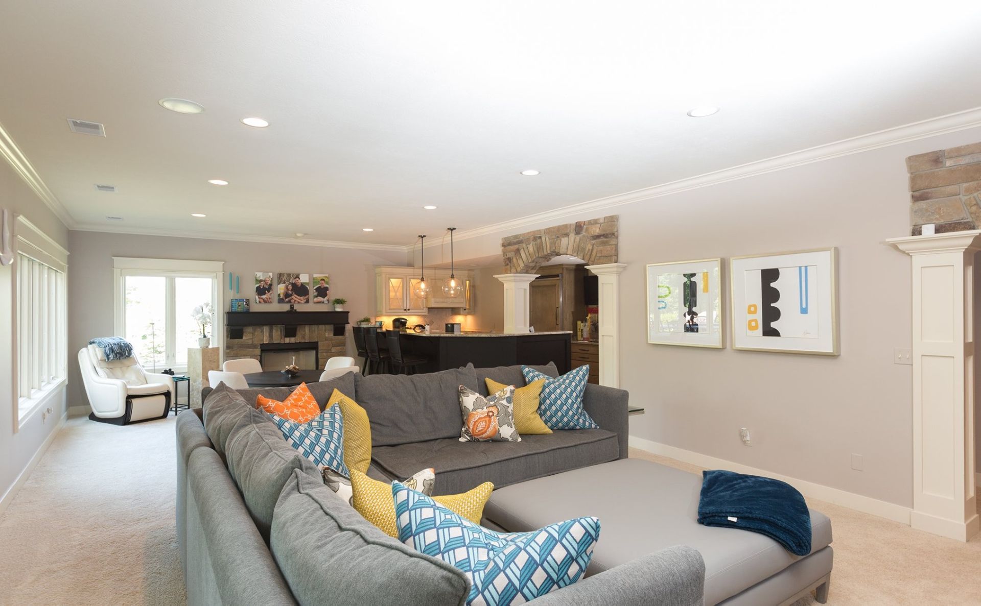 A living room filled with furniture and a large couch.