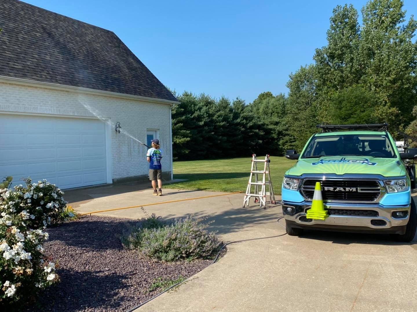 Green Pro Services soft washing a home exterior in Kankakee, Illinois