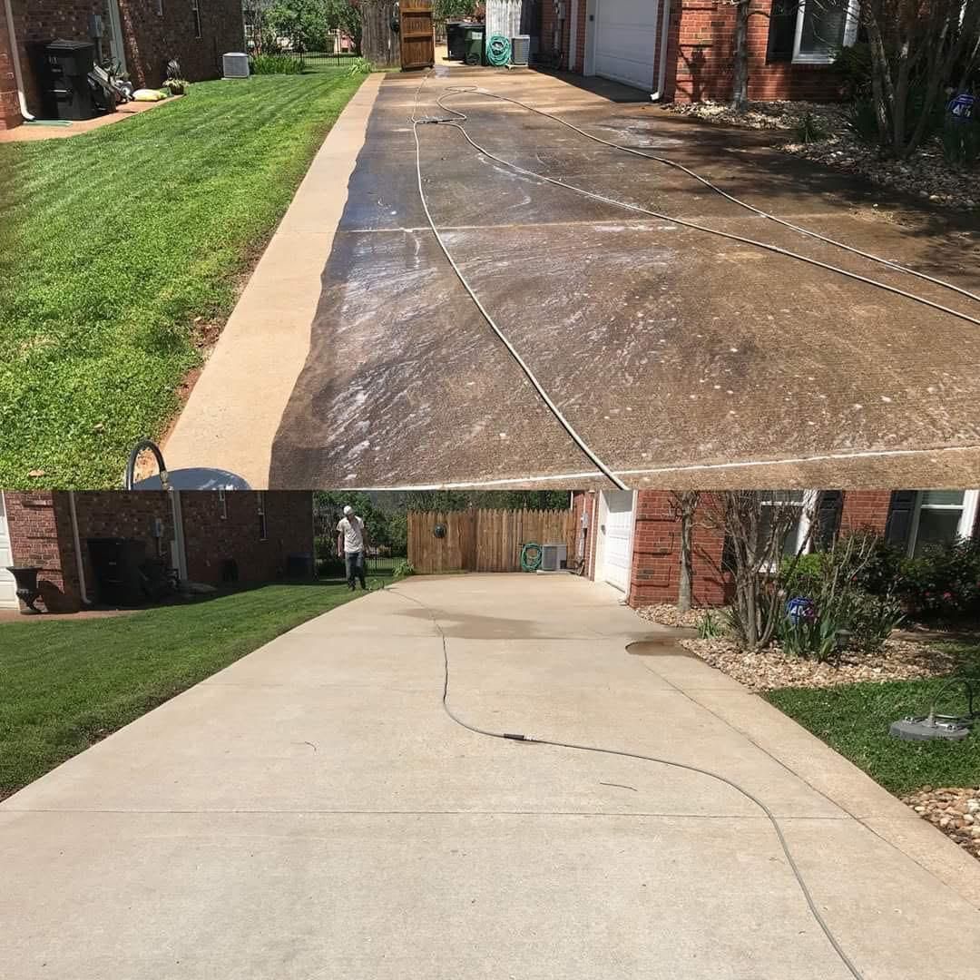 Before and after of a concrete driveway being cleaned, showing a dark, dirty surface transformed into bright, clean gray.