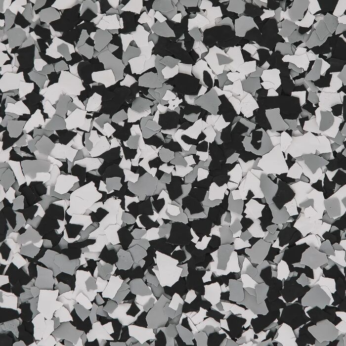 Black, gray, and white garage floor flake blend installed by Green Pro Services in Kankakee IL