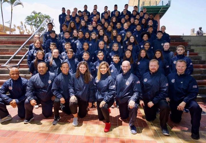 A large group of people are posing for a picture