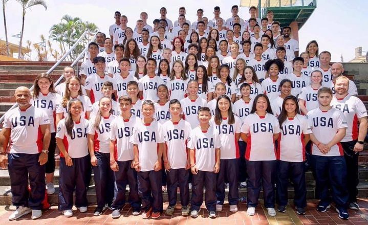 A large group of people wearing usa shirts