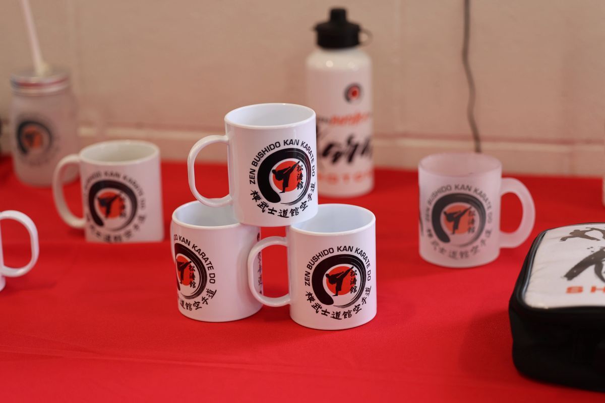 A group of coffee mugs stacked on top of each other