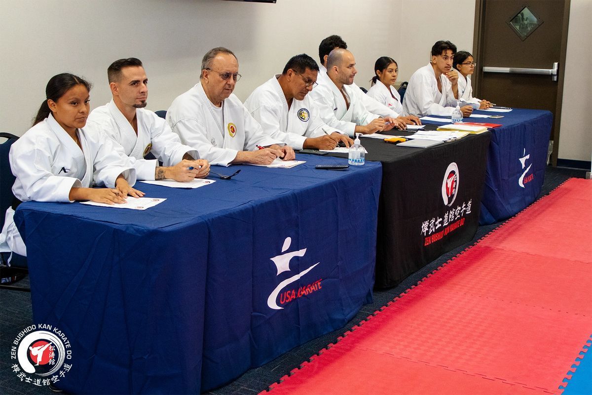 A group of people are sitting at tables in a room.