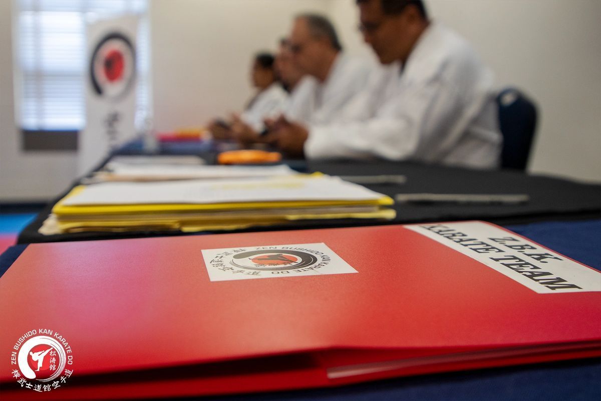 A red folder with the word karate on it