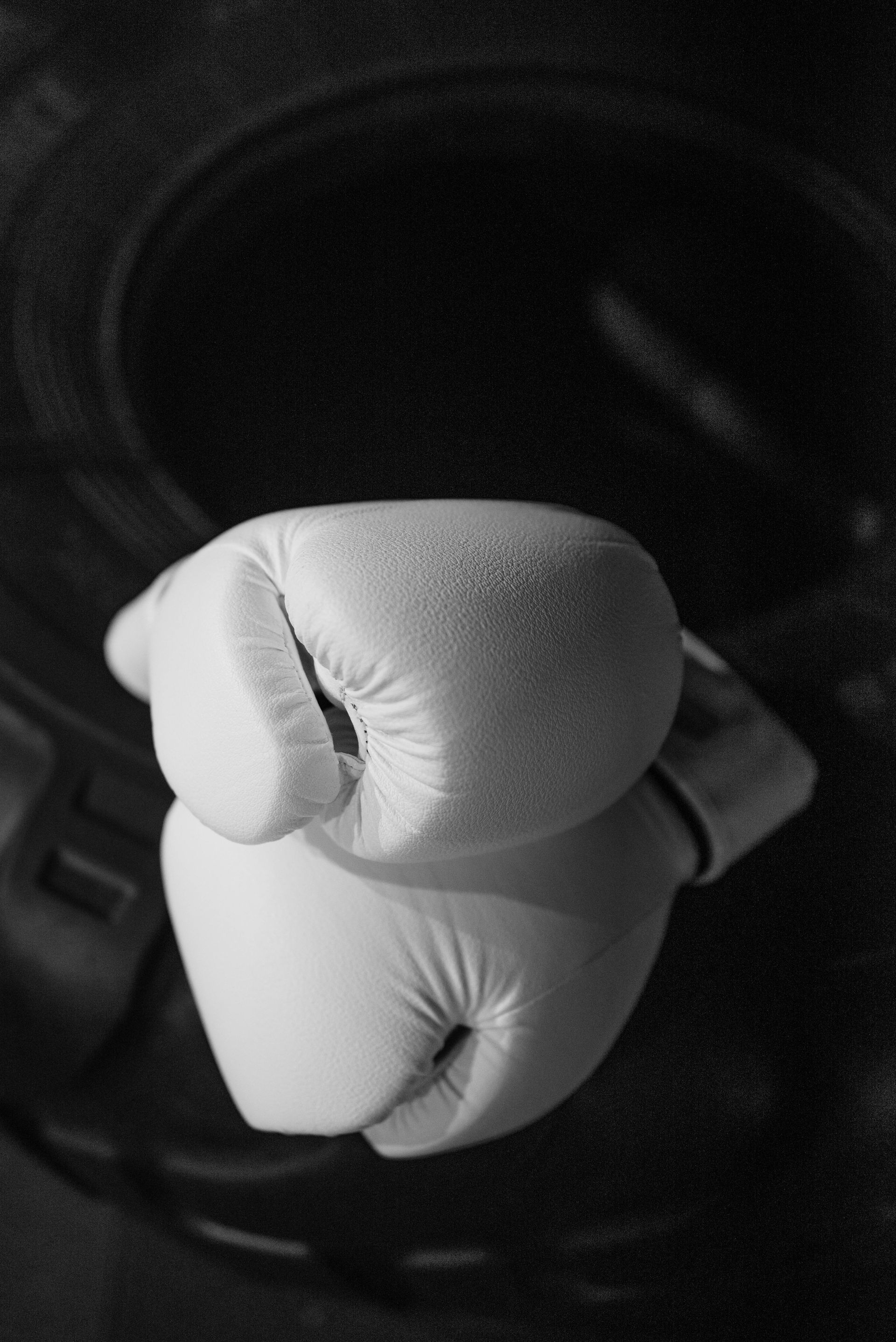 a black and white set of boxing gloves