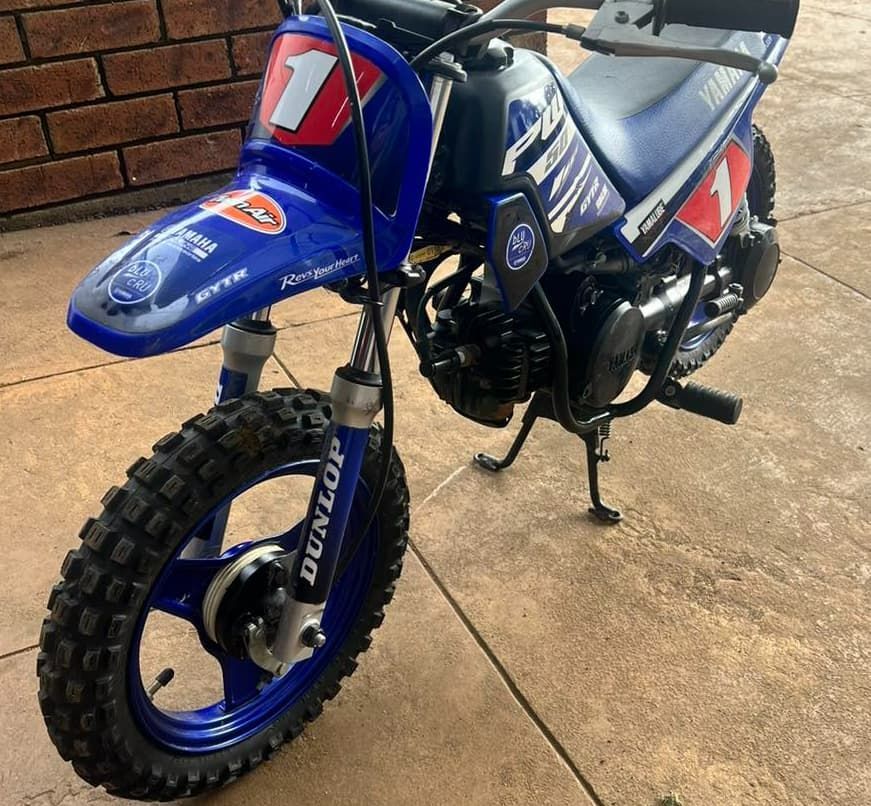 A Blue Dirt Bike With The Number 1 On It — Extreme Motorcycles In Atherton, QLD