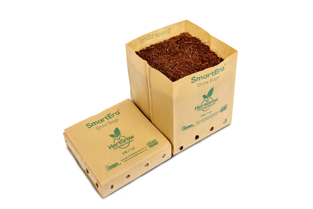 Black patterned box on a tan QuickFit cardboard carton against a white background