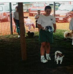 girl with papillon at a dog show